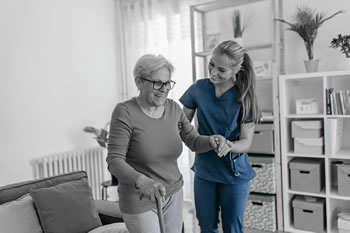 Nurse helping patient